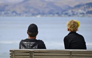Man thinking about reconnecting with an ex-girlfriend after a breakup