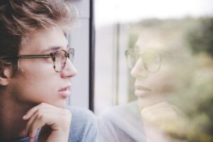 Man reflecting on personal growth, self-awareness and becoming a better version of himself