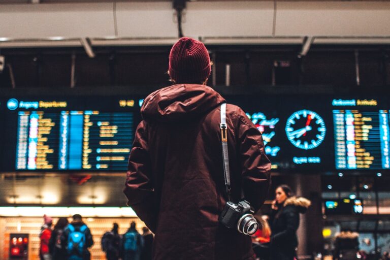 Male traveler preparing for an international trip, illustrating Passport Bro and global dating strategy