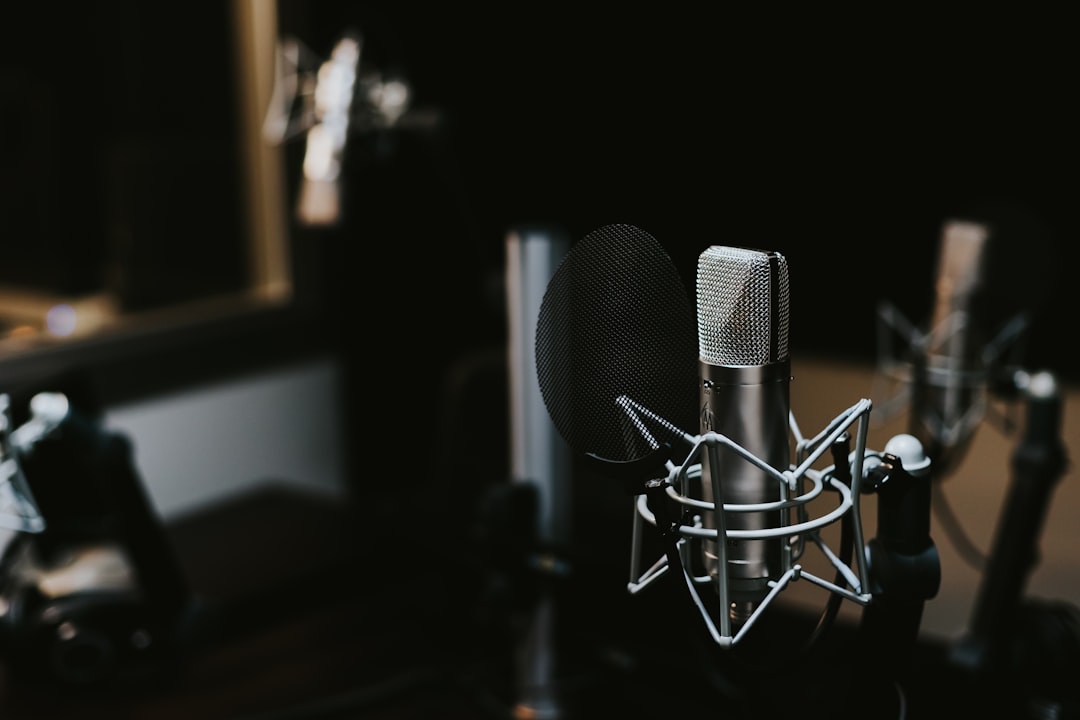 Studio microphone representing dating podcasts, coaches and creator media