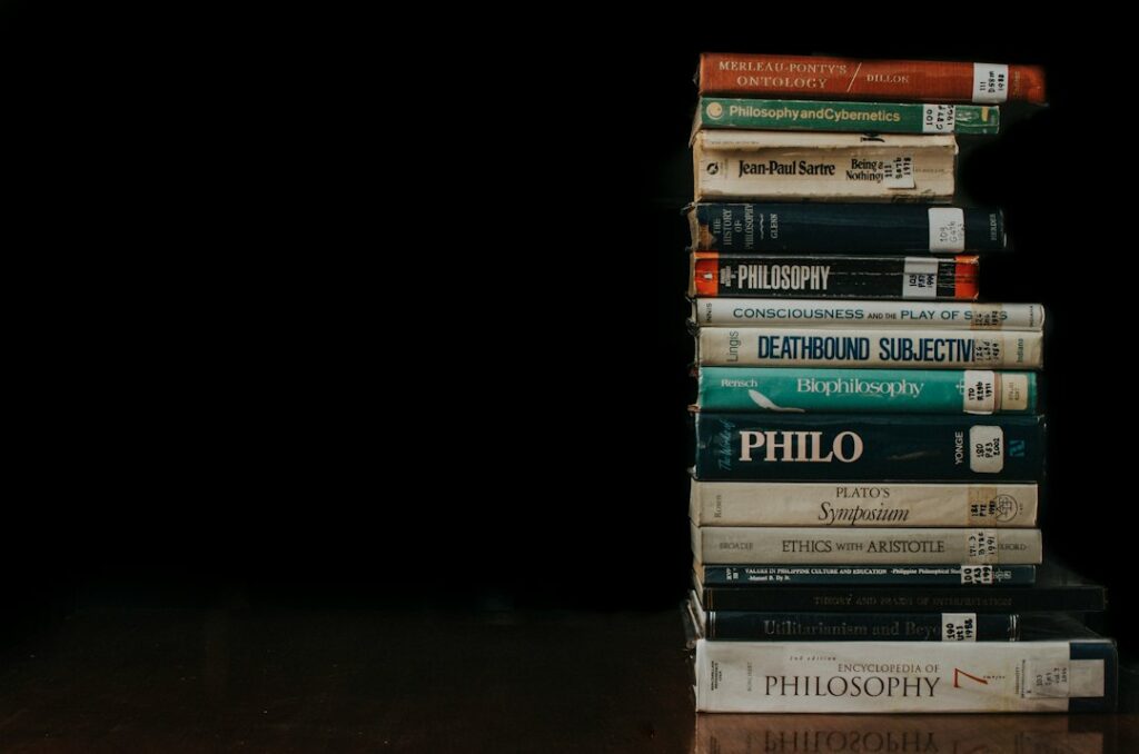 A stack of books representing dating and social-skills literature