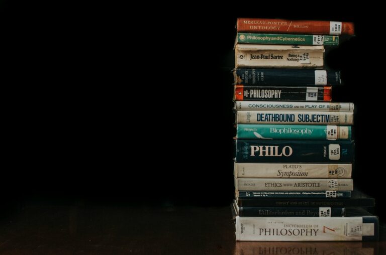 A stack of books representing dating and social-skills literature