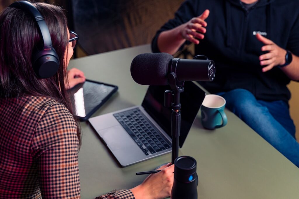 Podcast host and guest discussing modern dating and creator culture