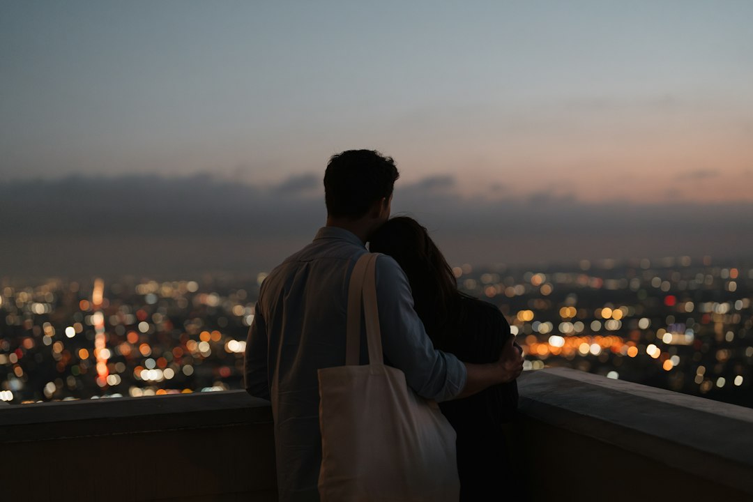 A couple traveling together in a city