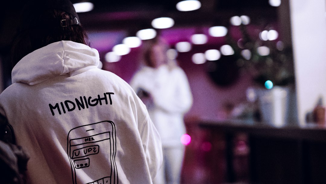 Hip-hop influenced fashion in a nightlife setting