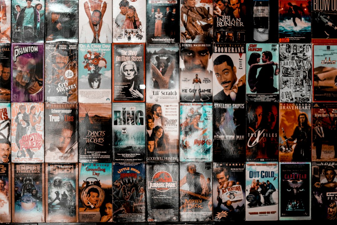 A wall of entertainment movie artwork